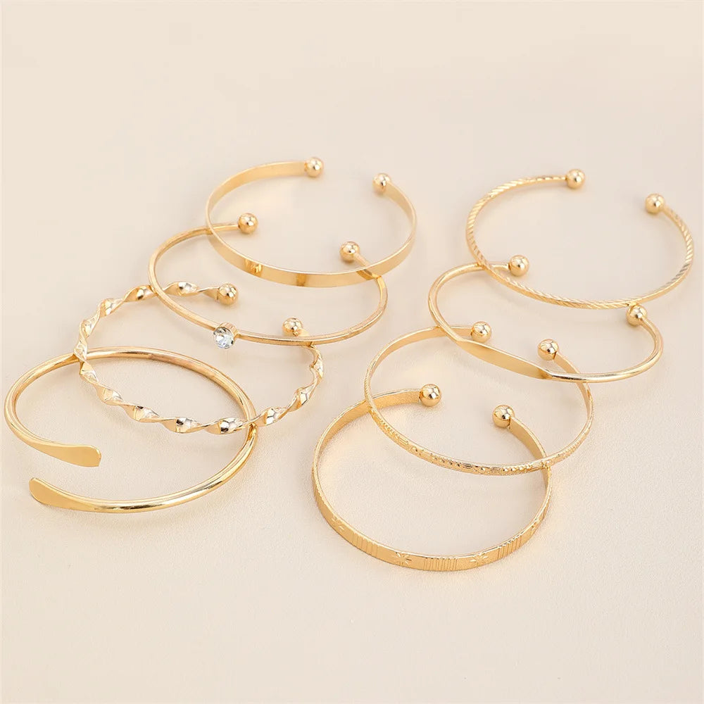 Set de 8 Bracelets Bangles – Texture Torsadée & Cristal Géométrique